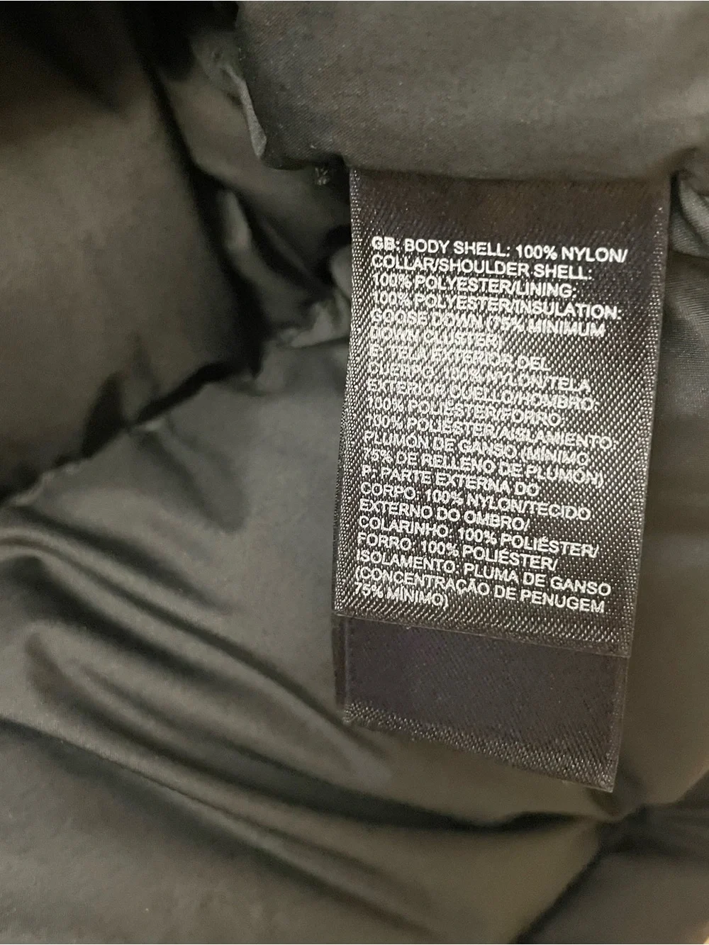 The North Face Nuptse 700 puffer vest Size M. buffalo plaid design on the yoke.